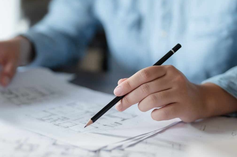 builder reviewing construction drawings